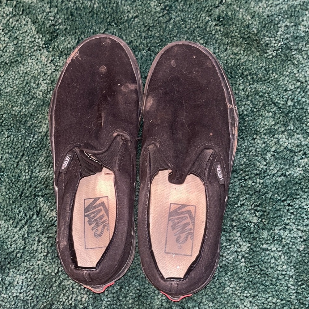 size 7: all black vans.